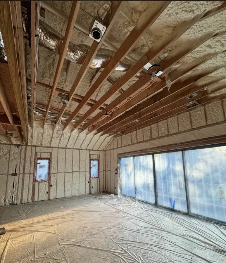 Interior walls and ceiling insulated with spray foam during new construction in Painesville